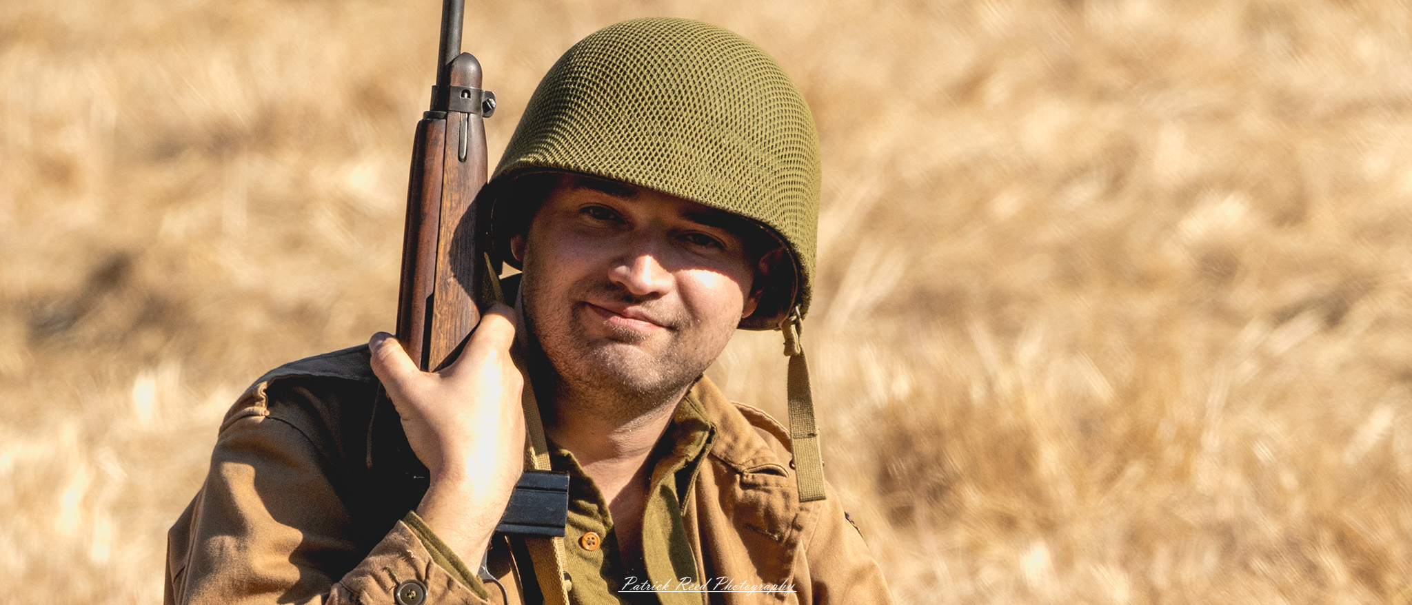 "Portrait of a U.S. GI (Government Issue) soldier, showcasing the soldier's pride and resolve during WWII. The soldier is dressed in a standard military uniform with insignia, wearing a helmet, and has a serious yet determined expression. The background is softly blurred to highlight the soldier's face, emphasizing their commitment to duty and service. This image captures the essence of bravery and sacrifice associated with the men and women who served during this pivotal time in history."